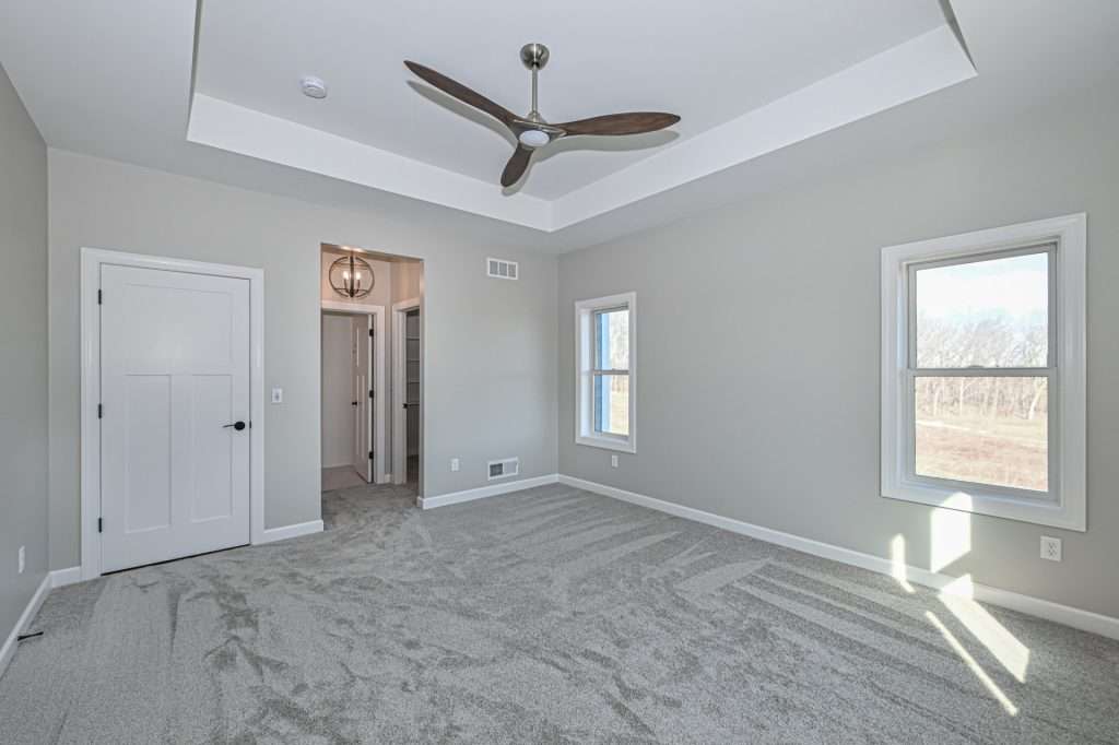 Custom home, carpeted bedroom flooring